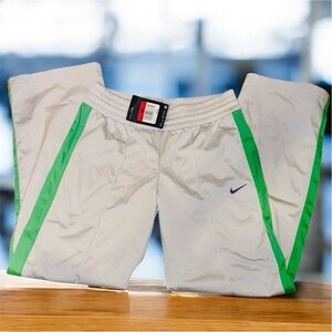 Nike Kids White Joggers with Green and Purple Accents